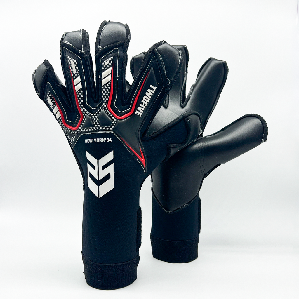 Guantes de Arquero New York '94 Contacgrip goalkeeper gloves in black with red and white details, padded fingers and wrist support.