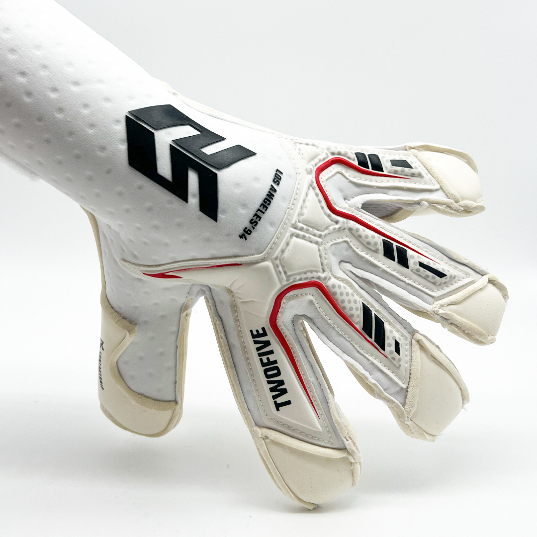 White goalkeeper glove Guantes de Arquero Los Angeles '94 Contacgrip with black and red details showing palm side design.