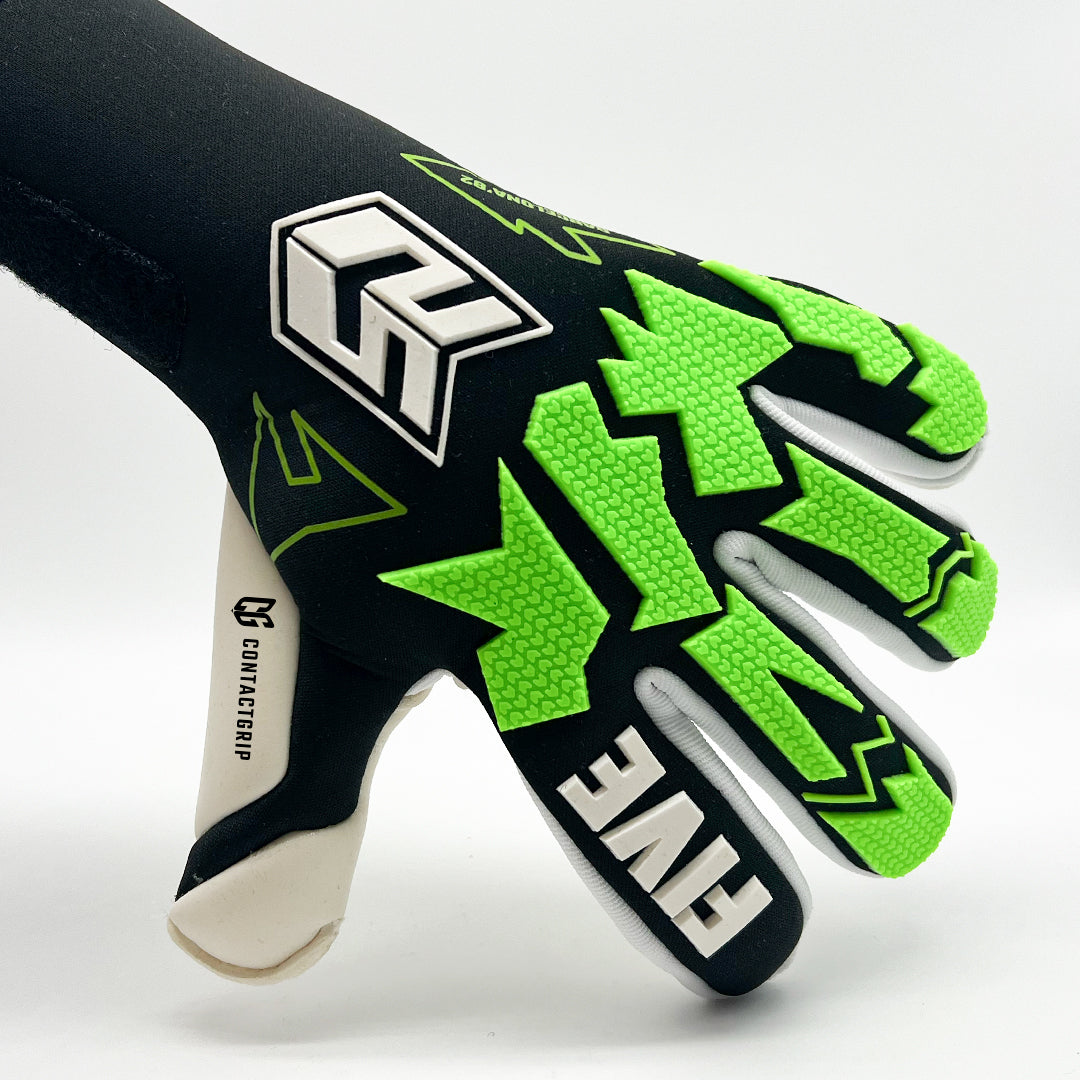 Guantes de Arquero Barcelona '82 Contacgrip goalkeeper glove in black with green textured grip and white details.